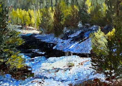 Oil painting of lit distant trees near the end of a winter day along the Tumalo Creek above Bend Oregon, by artist Shelly Wierzba.