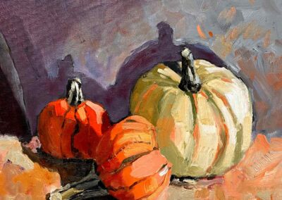 Impressionistic still life painting of three pumpkins, two small and one medium sized, in oranges and violets.
